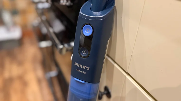 A closeup of the Philips OneUp mop's controls