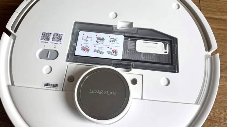The Switchbot S20 robot vacuum with top removed, showing primary controls