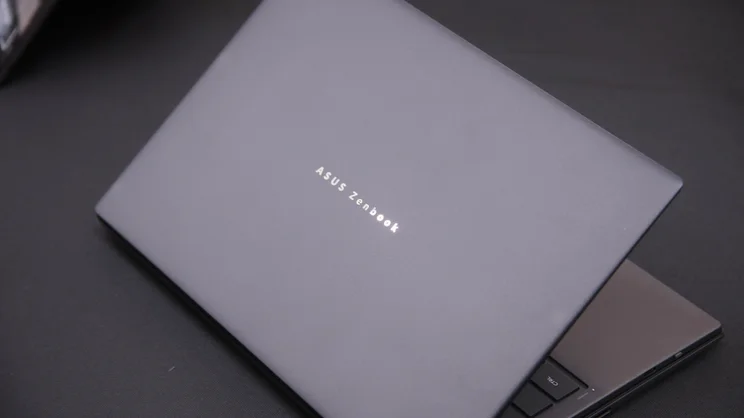 The Asus Zenbook Duo (2026), half closed, photographed from above