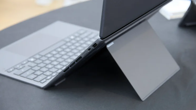 The Asus Zenbook Duo (2026) in desktop mode pictured from the right edge showing the kickstand