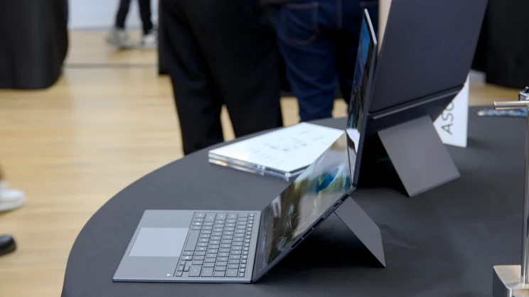 The Asus Zenbook Duo (2026) in landscape desktop mode, pictured from the right side