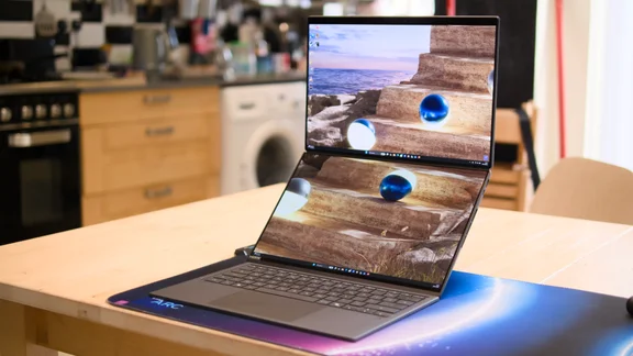 The Asus Zenbook Duo 2026, open fully on a kitchen table