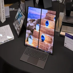 The Asus Zenbook Duo (2026) pictured in desktop mode with the displays in portrait orientation