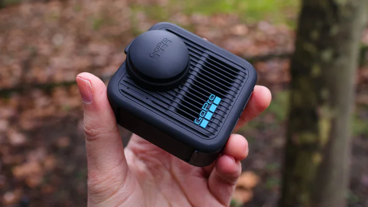 The GoPro Max 2 pictured at an angle from the front with its lens cap on