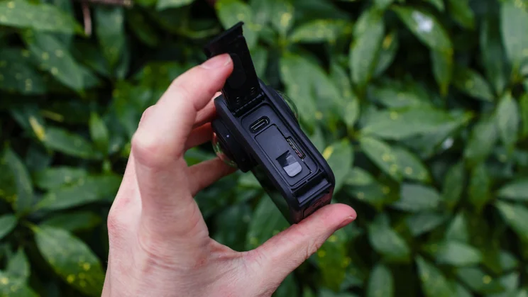 The GoPro Max 2 pictured with the battery door open