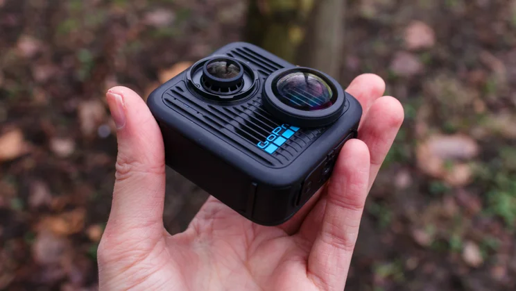 The GoPro Max 2 pictured withe one of its screw on lens cap protectors removed _2