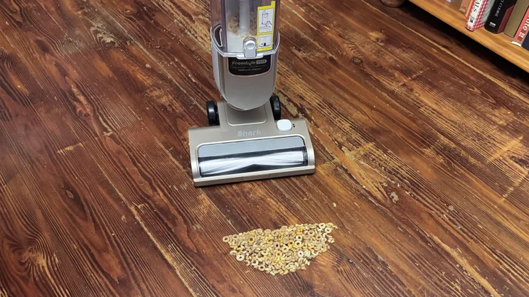 The Shark Freestyle Pro after testing with Cheerios on hard floor