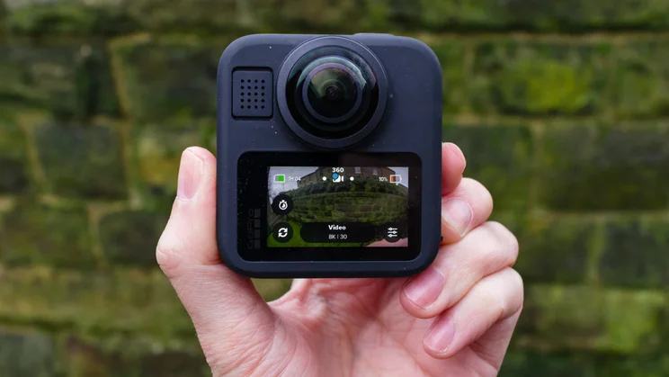 The rear of the GoPro Max 2, shown held in hand
