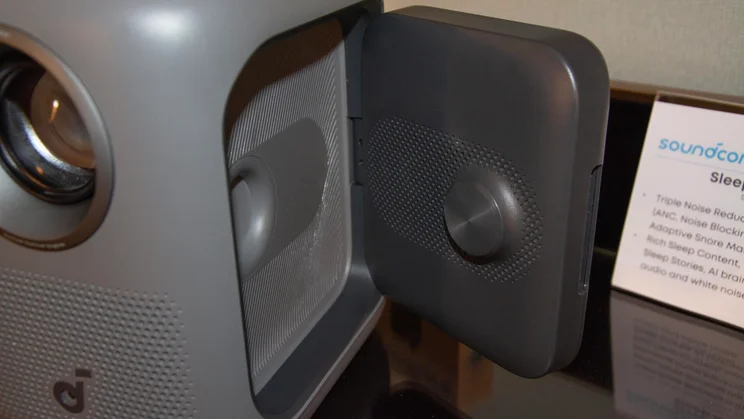 Side view of the Anker Soundcore Nebula P1i showing off one of its fold-open speakers