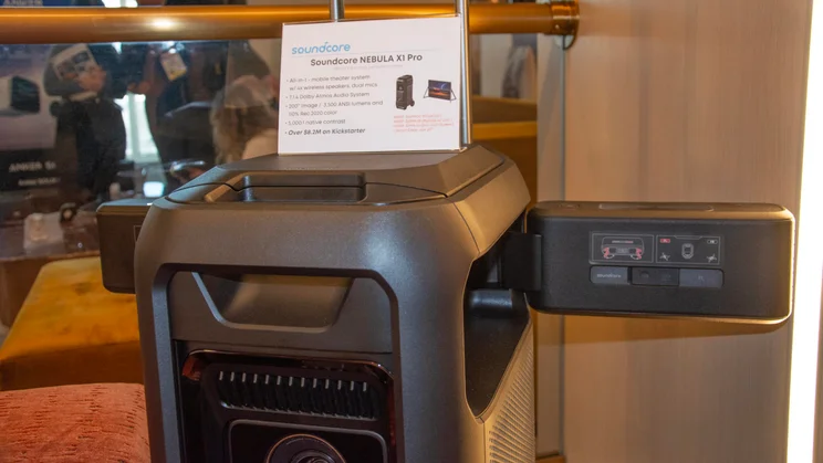 The Anker Soundcore Nebula X1 Pro projector with two of its speakers revealed