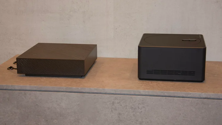 The LG One Connect Box that comes with the LG Wallpaper TV side by side with last year's Zero Connect box