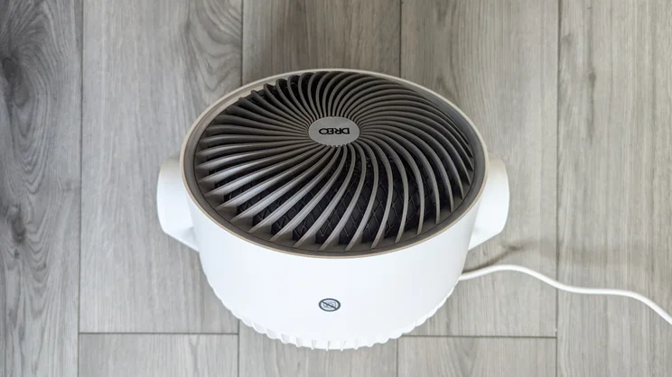 A bird's eye view of the Dreo Smart Whole Room Heater 714s on the floor