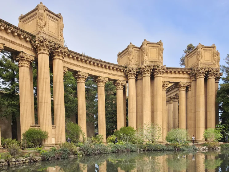 Stone pillars by a lake