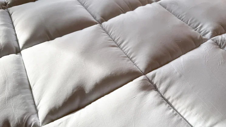 A closeup of the The Slumberdown Sleep Soundly Extra Deep Climate Control mattress topper's surface