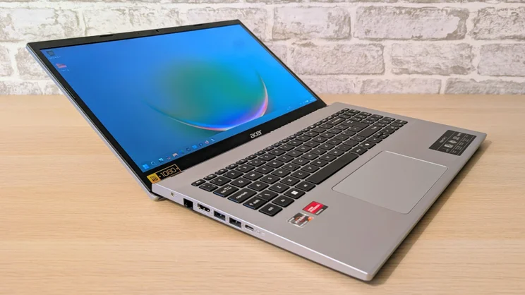 The Acer Aspire Go 15 (AG15-42P), open, pictured from the left front quarter