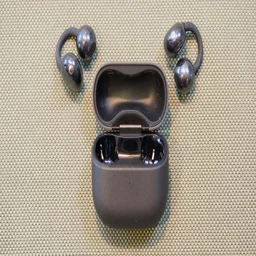 The Huawei FreeClip 2 and charging case, open