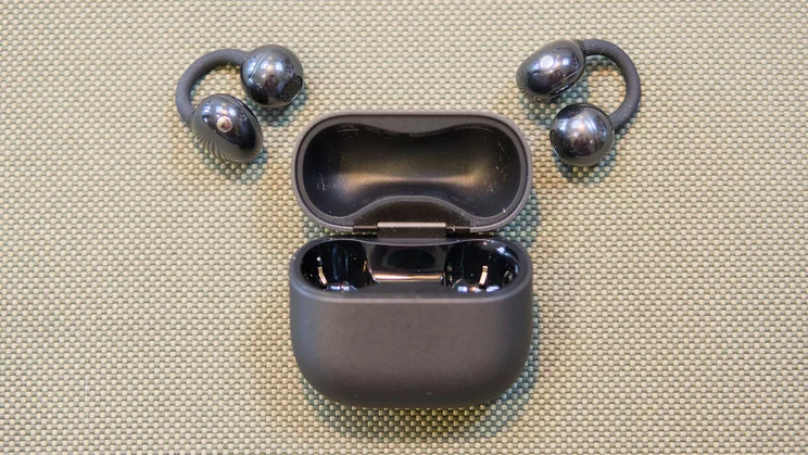 The Huawei FreeClip 2 and charging case, open