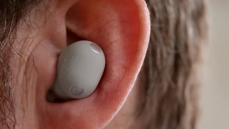 The Sony WF-1000XM6 left earpiece being worn in the ear