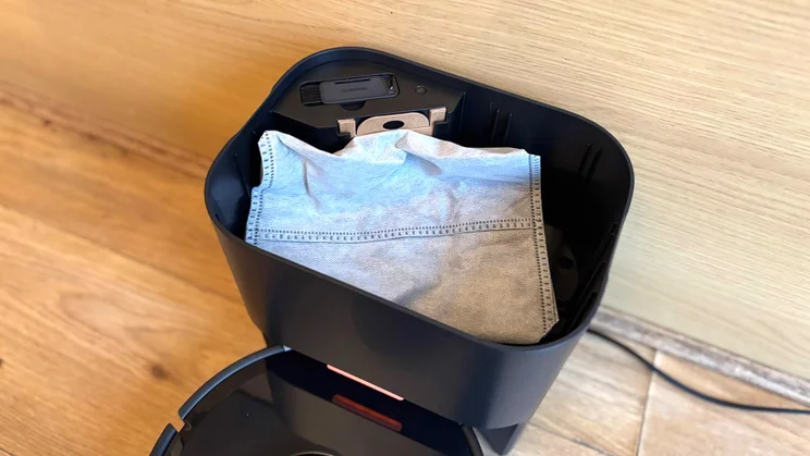 The Switchbot K11+ robot vacuum base's dust collector, viewed from above