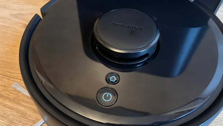 A closeup of the top of the Switchbot K11+ robot vacuum
