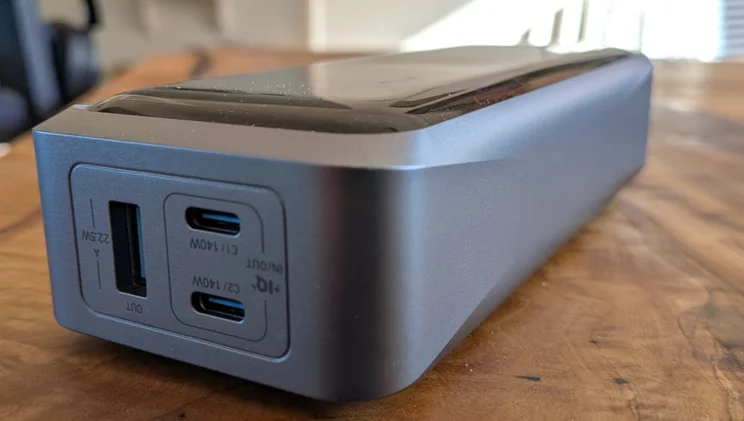 The Anker Prime A110A shown on a wooden table with its three ports facing the camera