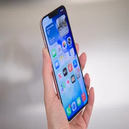 The Apple iPhone 17e pictured being held at a slight angle