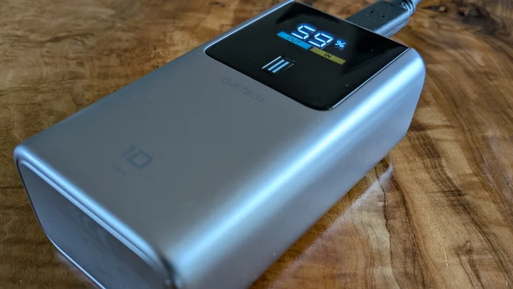 Cuktech Mini 10 on its back on a wood table