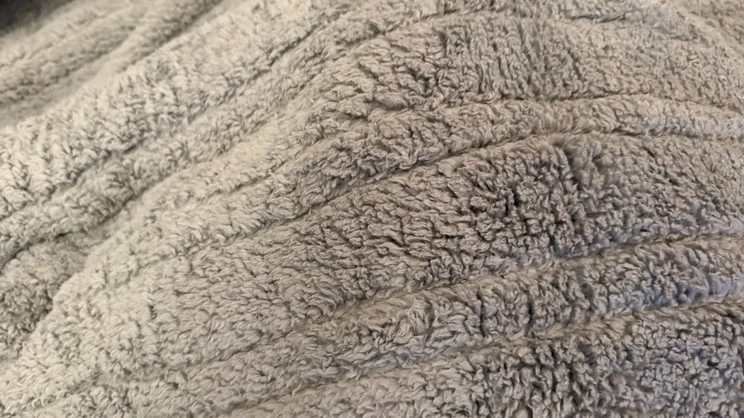 A closeup of the Dunelm Teddy Electric Throw's surface