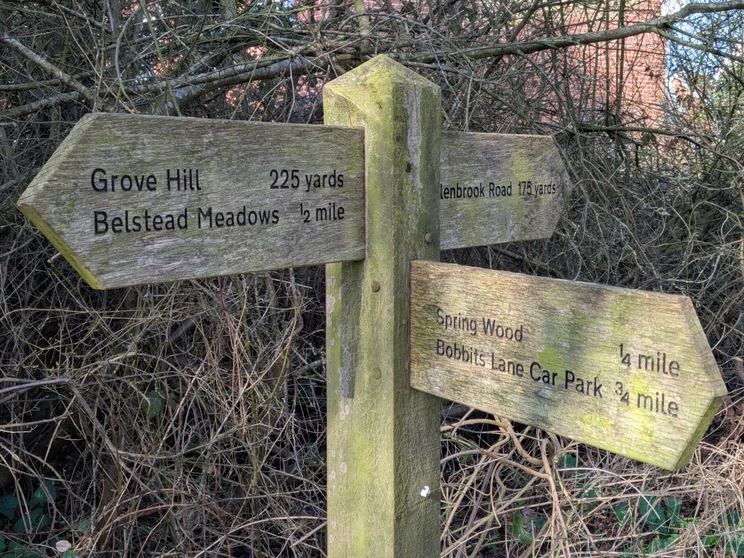 A wooden signpost