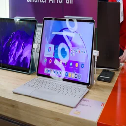 A photograph of the Lenovo Idea Tab Pro Gen 2 on the Lenovo stand at MWC 2026