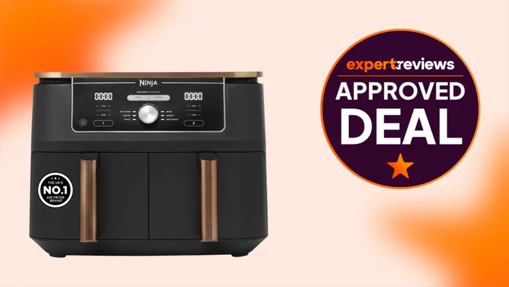 The Ninja Foodi Max Dual Zone air fryer on an orange and white background. A badge to the right reads "Expert Reviews Approved Deal"