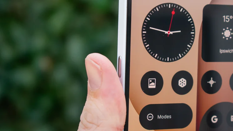 Thumb pressing the Nothing Phone (4a)'s Essential Key