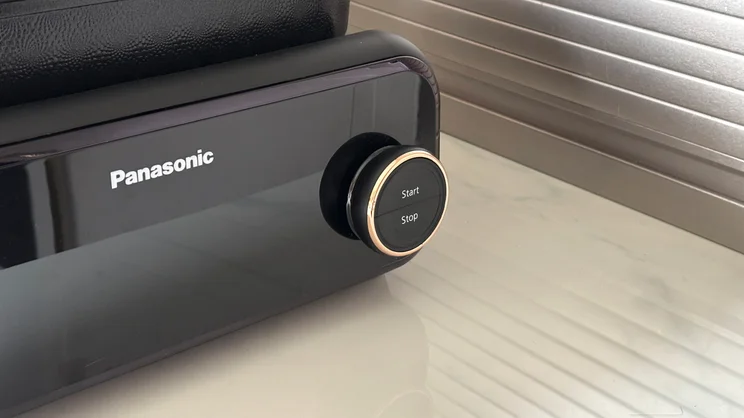 A closeup of the Panasonic 6-in-1 Table-top Multi Cooker's control dial