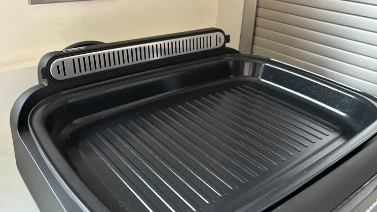 A closeup of the Panasonic 6-in-1 Table-top Multi Cooker, with griddle plate attached