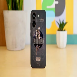 Poco X8 Pro upright on a table, rear view, showing limited edition Iron Man decal