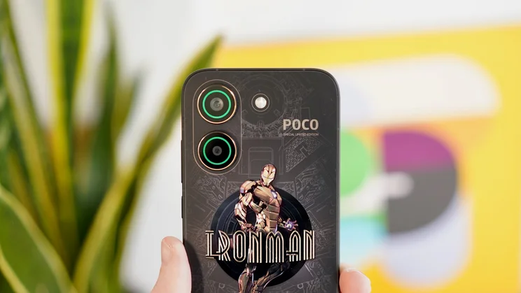 Poco X8 Pro in hand, rear view, RGB lights on