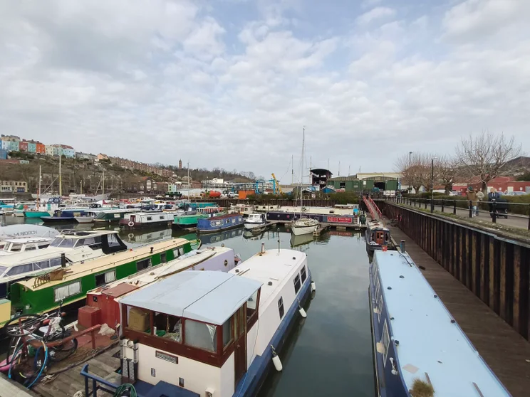 Wide-angle shot of a harbour full of boats