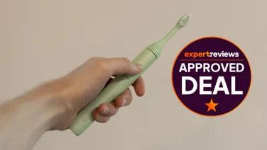A hand holding the Suri 2.0 electric toothbrush, alongside a badge reading "Expert Reviews Approved Deal"