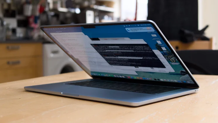 The M5 MacBook Air, half closed, pictured from the front