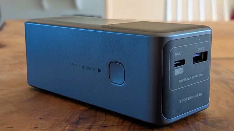 The ports and button on the UGreen Nexode PB724 pictured close up