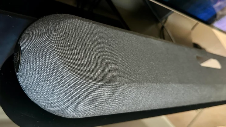 View of the Bluesound Pulse Cinema Mini soundbar from the left-hand side, showing its rounded corner