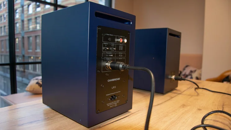 Rear view of the Cambridge Audio L/R S active speakers connected to each other