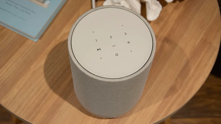 Top-down view of the Denon Home 200 wireless speaker showing its touch controls