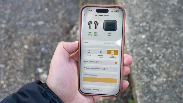 The EarFun companion app being displayed on the screen of an iPhone