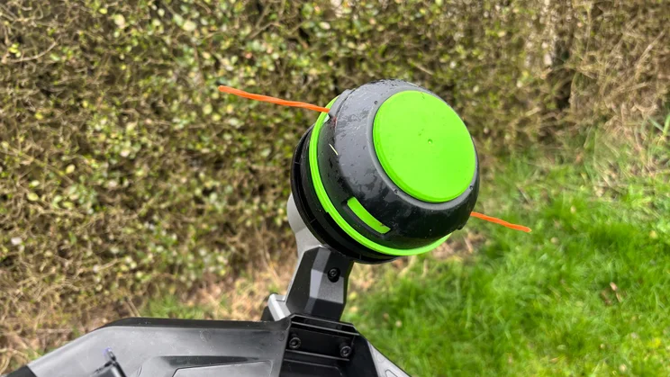A closeup of the Ego ST1511E-T grass trimmer's cutting head