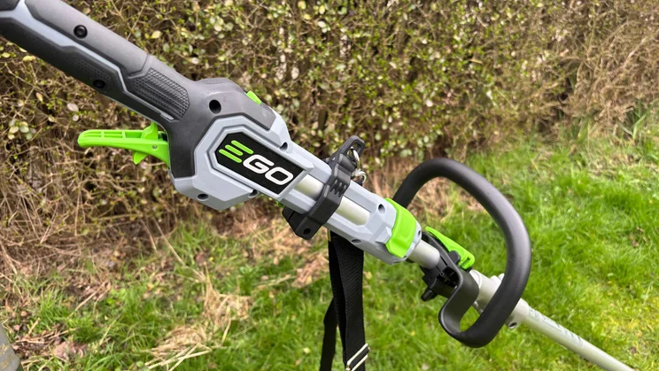 The Ego ST1511E-T grass trimmer's handle and strap