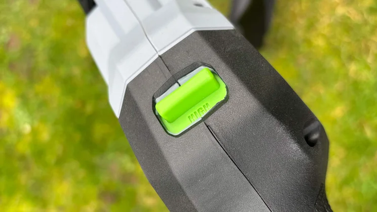 A closeup of the Ego ST1511E-T grass trimmer's speed selector