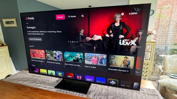 View of the Hisense U7Q Pro Mini LED TV from the right-hand side displaying the VIDAA homepage