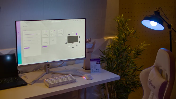 A Philips Evnia gaming monitor showing the control interface for Ambiscape