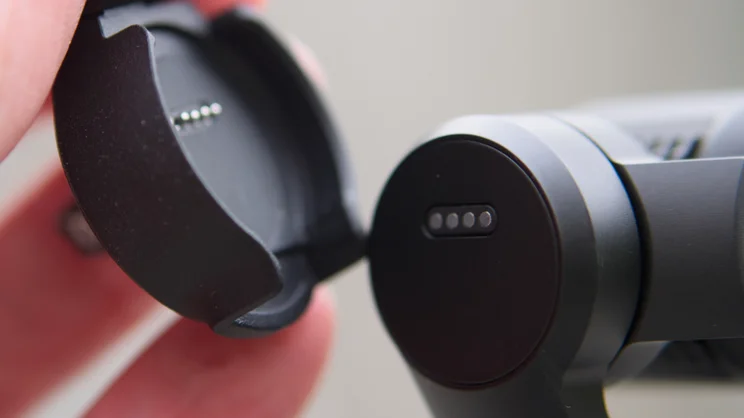 A close up view of the DJI OSMO Pocket 4's accessory point attachment